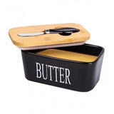 { "alt_text": "Black ceramic butter box with bamboo lid, airtight storage container for fresh butter, kitchen countertop accessory" }