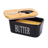 { "alt_text": "Black ceramic butter box with bamboo lid, airtight storage container for fresh butter, kitchen countertop accessory" }