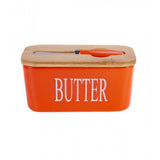{ "alt_text": "Orange ceramic butter box with bamboo lid, airtight storage container for fresh butter, kitchen countertop accessory" }