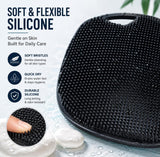 Black silicone body scrubber brush with textured side for body and soft spikes for scalp massage