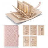 { "alt_text": "Beige PU leather jewelry organizer book with velvet interior, expandable jewelry storage box for women's accessories" }
