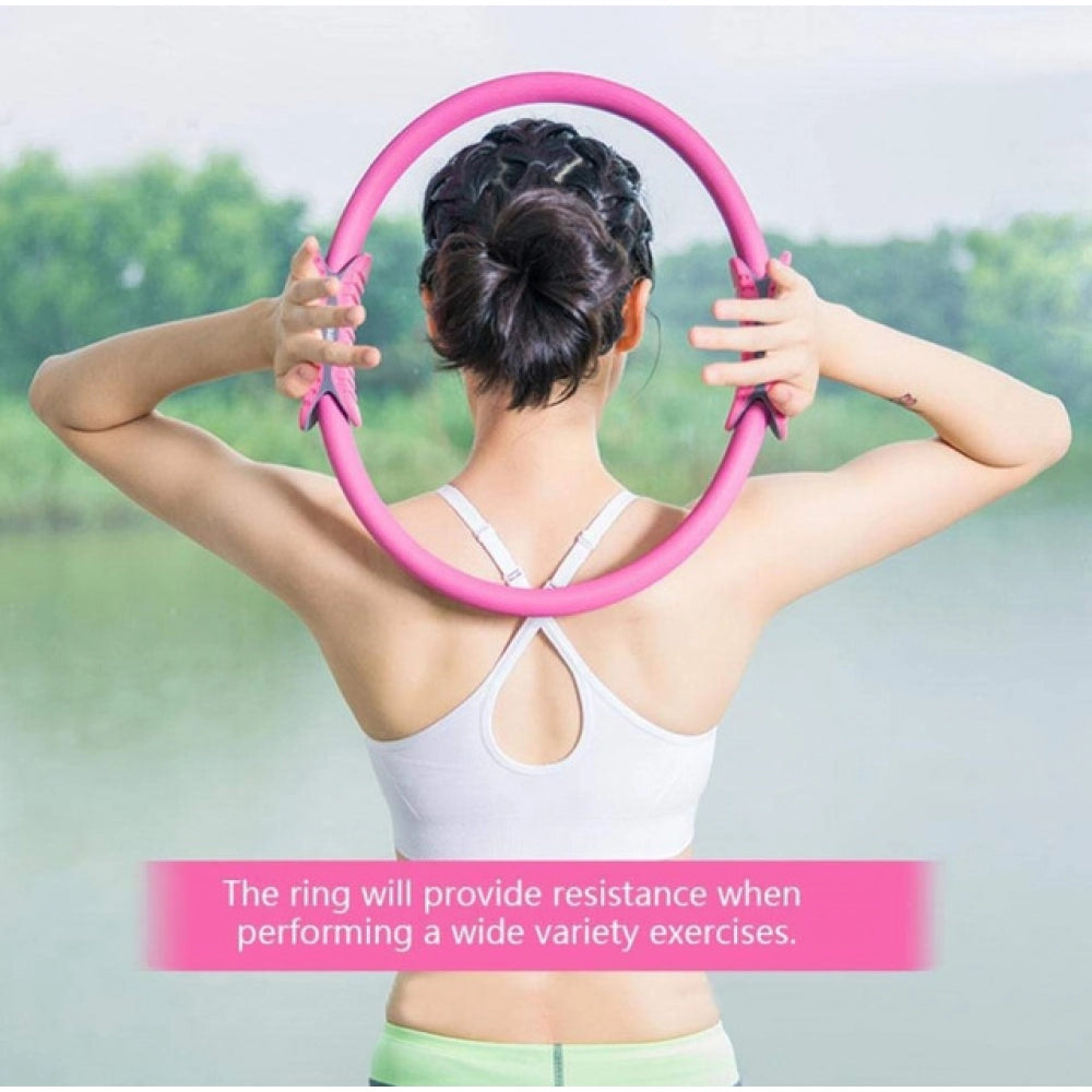 { "alt_text": "Pink rubber yoga pilates ring for core workout, abdominal, and thigh toning exercise equipment" }