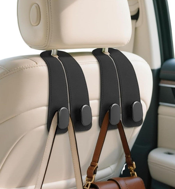 Black PU leather car seat headrest hooks with heavy-duty double metal hooks for organizing bags and bottles