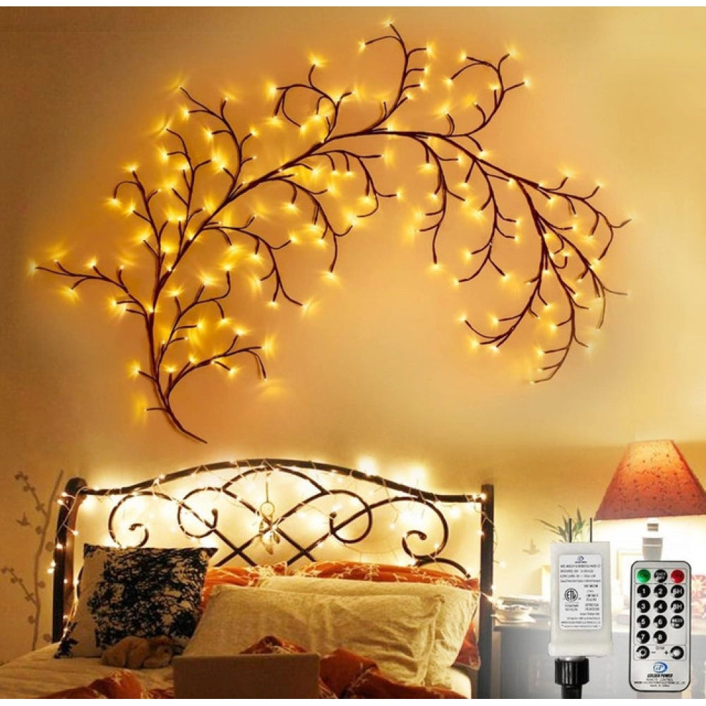 Yellow bendable willow vine light: Customizable tree branch layout with evenly spaced LED blossoms, ideal for bedroom mood lighting and decorative accent illumination