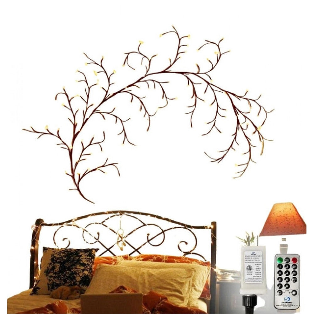 Yellow bendable willow vine light, tree branch layout with evenly spaced LED blossoms for bedroom mood lighting and decorative accent illumination. USB powered design with remote control for brightness and mode adjustment