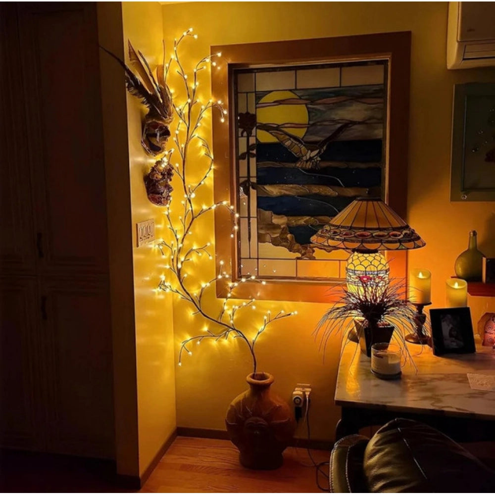Yellow willow vine light: Bendable, tree branch layout with evenly spaced LED blossoms for cozy bedroom mood lighting. USB powered design with remote control