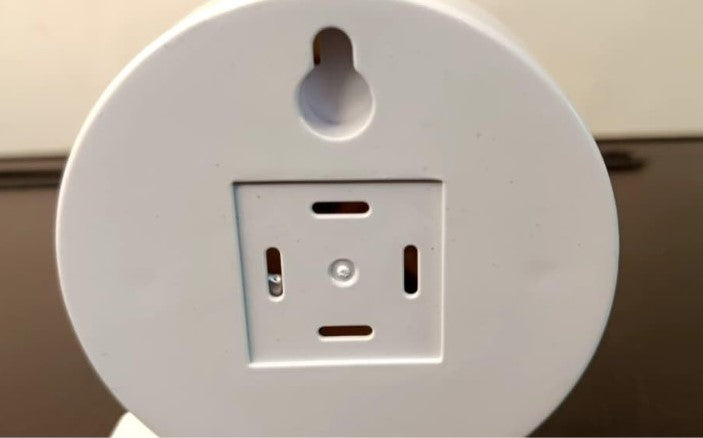White motion sensor LED light with magnetic attachment for hands-free illumination in dark areas