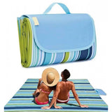 { "alt_text": "Blue smooth fabric picnic mat, spacious portable ground cover for family outings and camping" }