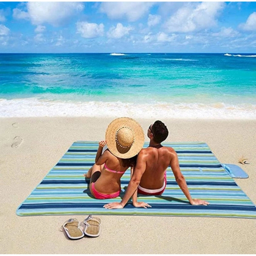 { "alt_text": "Blue smooth fabric picnic mat, spacious portable ground cover for family outings and camping" }