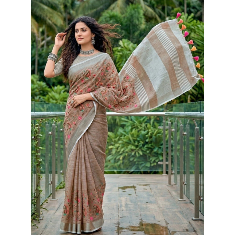 { "alt_text": "Brown linen saree with floral embroidery, unstitched blouse, 5.5Mtr ethnic wear for women" }