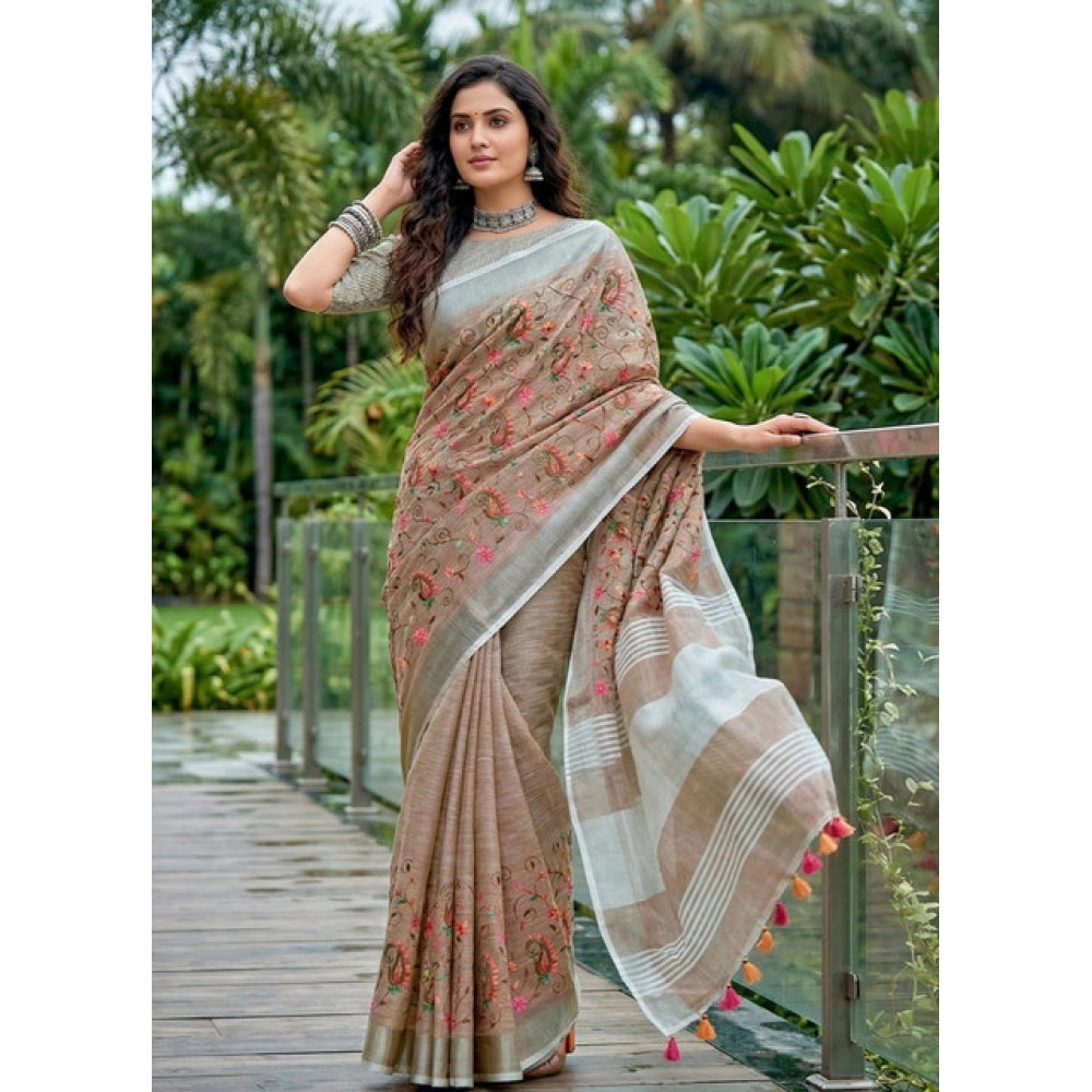 { "alt_text": "Brown linen saree with floral embroidery, unstitched blouse, 5.5Mtr ethnic wear for women" }