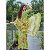 { "alt_text": "Light green linen saree with floral embroidery, unstitched blouse, 5.5m linen ethnic wear for women" }