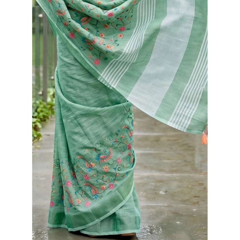 { "alt_text": "Sea Green linen saree with floral embroidery, unstitched blouse, 5.5Mtr ethnic wear for women" }