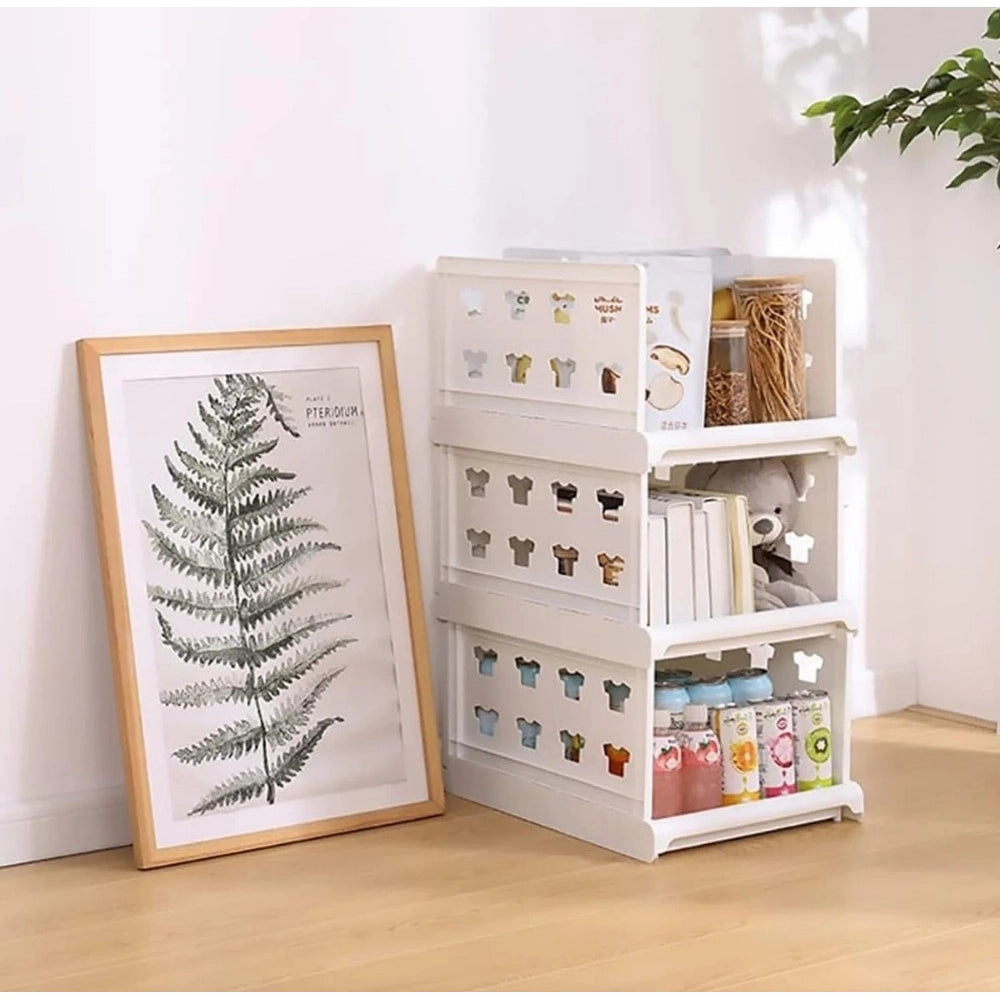{ "alt_text": "White plastic foldable stackable storage organizer for closet organization, easy to store household items" }
