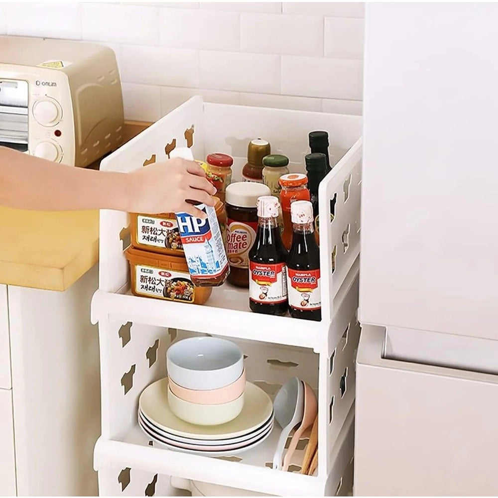 { "alt_text": "White plastic foldable stackable storage organizer for closet organization, easy to store household items" }