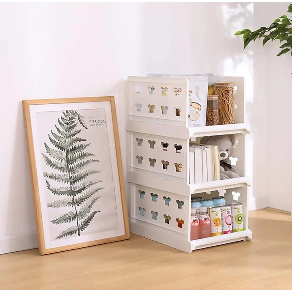 { "alt_text": "White plastic foldable stackable storage organizer for closet organization, easy to store household items" }