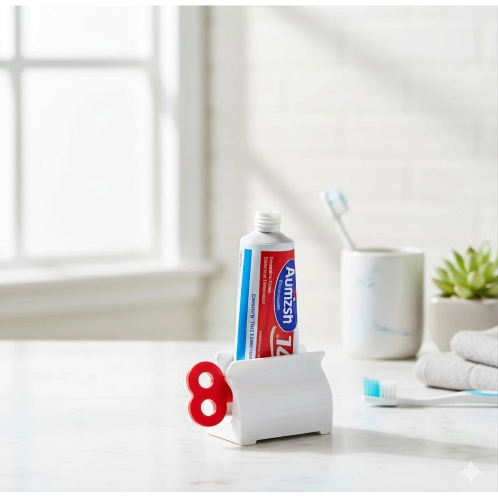 { "alt_text": "Multicolor plastic toothpaste squeezer pack of 2, easy-to-use bathroom hygiene tool" }