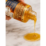 { "alt_text": "Clear liquid marble polish bottles, 100 ML each, for enhancing shine and finish of marble surfaces" }