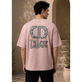 { "alt_text": "Pink cotton blend men's oversized t-shirt, printed casual wear, round neck half sleeve, 220 GSM" }
