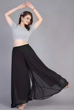 { "alt_text": "Black georgette women's palazzo pants, solid high-rise wide leg flared pants, ankle length ethnic wear" }