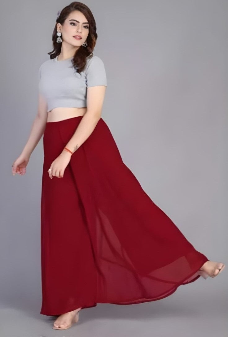 { "alt_text": "Maroon georgette women's palazzo pants, solid high-rise wide leg flared pants, ankle length ethnic wear" }