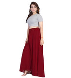 { "alt_text": "Maroon georgette women's palazzo pants, solid high-rise wide leg flared pants, ankle length ethnic wear" }