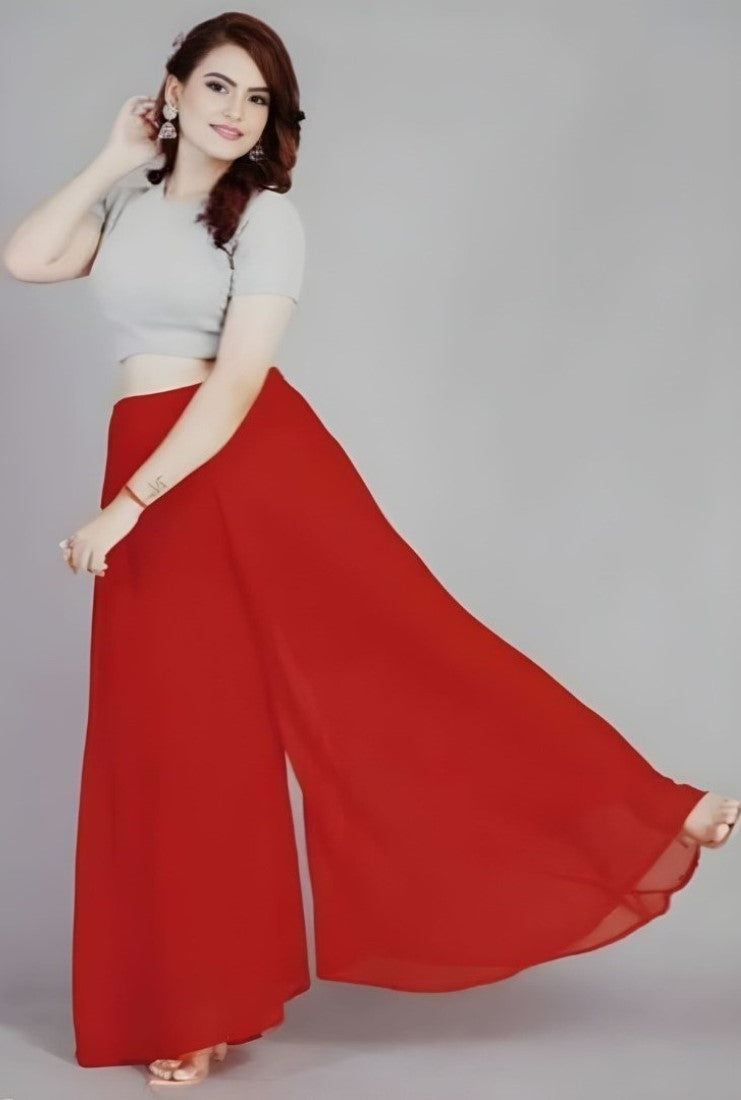 { "alt_text": "Red georgette women's palazzo pants, solid high-rise wide leg flared palazzo, ankle length elastic waist" }