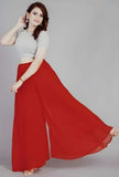{ "alt_text": "Red georgette women's palazzo pants, solid high-rise wide leg flared palazzo, ankle length elastic waist" }