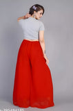 { "alt_text": "Red georgette women's palazzo pants, solid high-rise wide leg flared pants, ankle length ethnic wear" }
