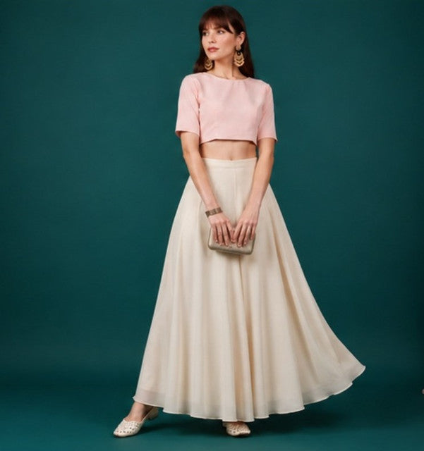 { "alt_text": "Cream georgette women's palazzo pants, solid mid-rise wide leg flared pants, comfortable elastic waist clothing" }
