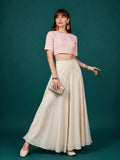 { "alt_text": "Cream georgette women's palazzo pants, solid mid-rise wide leg flared pants, comfortable elastic waist clothing" }