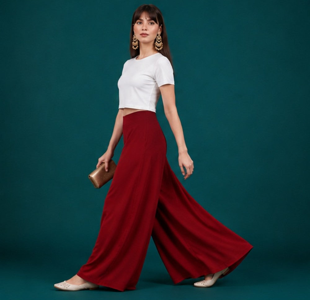{ "alt_text": "Maroon georgette women's palazzo pants, solid wide leg flared pants, mid-rise elastic waist ankle length" }