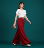 { "alt_text": "Maroon georgette women's palazzo pants, solid wide leg flared pants, mid-rise elastic waist ankle length" }