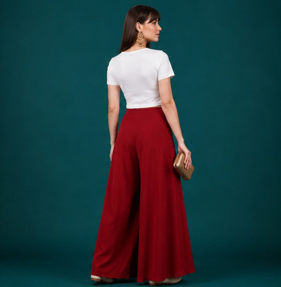 { "alt_text": "Maroon georgette women's palazzo pants, solid wide leg flared pants, mid-rise elastic waist ankle length" }