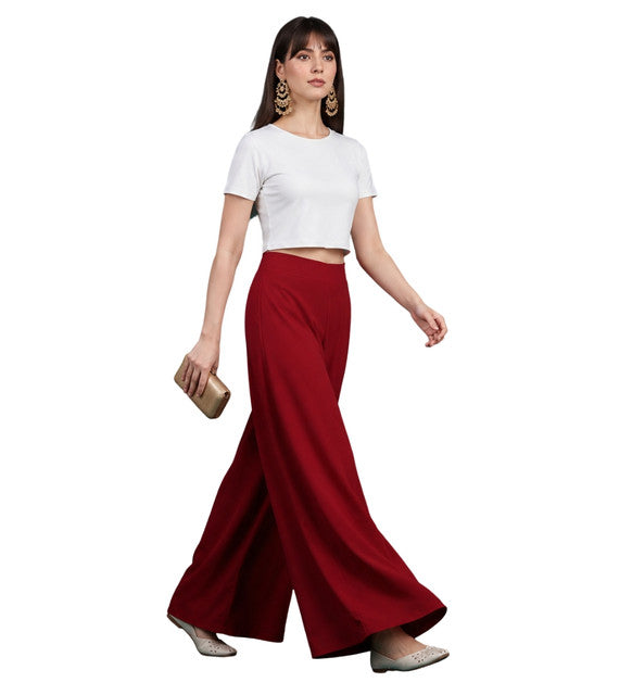 { "alt_text": "Maroon georgette women's palazzo pants, solid wide leg flared pants, mid-rise elastic waist ankle length" }