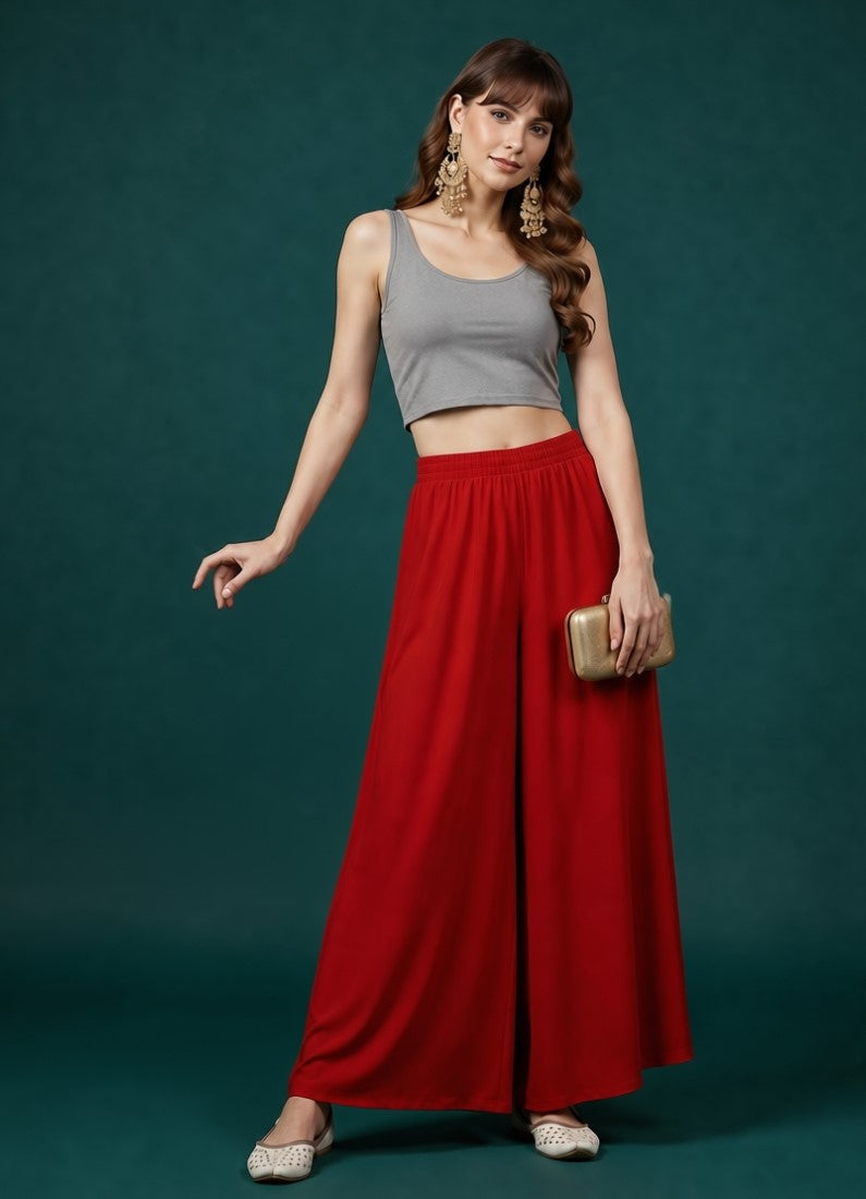 { "alt_text": "Red georgette women's palazzo pants, solid wide leg flared pants, mid-rise elastic waist ankle length" }
