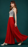 { "alt_text": "Red georgette women's palazzo pants, solid mid-rise wide leg flared pants, ankle length ethnic wear" }