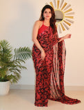 { "alt_text": "Black-red georgette printed saree with unstitched blouse, 5.5m, ethnic wear, Indian fashion" }