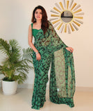 { "alt_text": "Black-green georgette printed saree with unstitched blouse, 5.5m, ethnic wear, Indian fashion" }