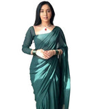 { "alt_text": "Dark green georgette solid saree with unstitched blouse, 5.5 meter ethnic wear, Indian fashion" }