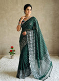{ "alt_text": "Dark green georgette striped saree with unstitched blouse, 5.5 meter ethnic wear, Indian fashion" }