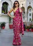 { "alt_text": "Magenta georgette saree floral printed women's ethnic wear, 5.5m unstitched blouse, Indian fashion" }