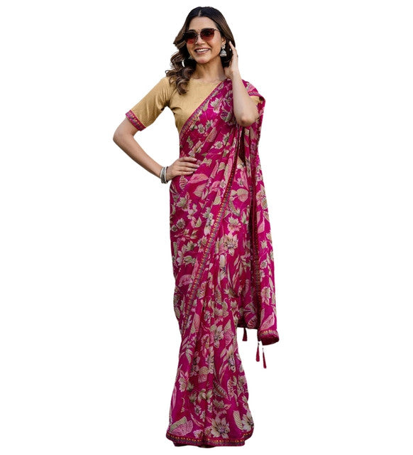 { "alt_text": "Magenta georgette saree floral printed women's ethnic wear, 5.5m unstitched blouse, Indian fashion" }