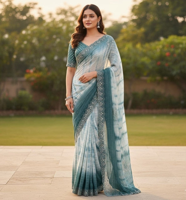 { "alt_text": "Ice blue georgette saree with unstitched blouse, striped ethnic wear, 5.5 meter georgette fabric" }