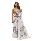 { "alt_text": "Off white georgette saree with floral butterfly print, 5.5m georgette saree for women, ethnic wear" }