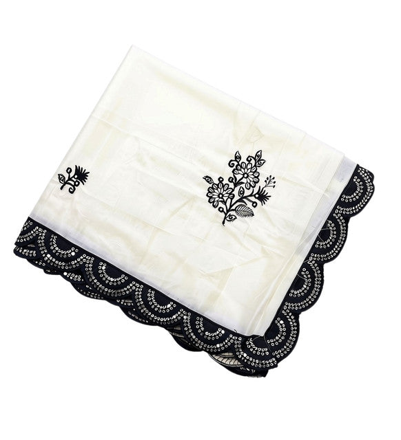 { "alt_text": "White-black georgette embroidered saree with unstitched blouse, 5.5Mtr ethnic wear, Indian fashion" }