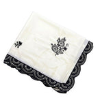 { "alt_text": "White-black georgette embroidered saree with unstitched blouse, 5.5Mtr ethnic wear, Indian fashion" }