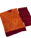 { "alt_text": "Orange-maroon georgette bandhani printed saree, 5.5m, ethnic wear, Indian wedding attire" }