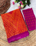{ "alt_text": "Orange-magenta georgette bandhani printed saree, 5.5m, ethnic wear, Indian wedding attire" }