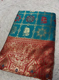 { "alt_text": "Teal jacquard printed saree with unstitched blouse, 5.5m, ethnic wear, Indian traditional clothing" }